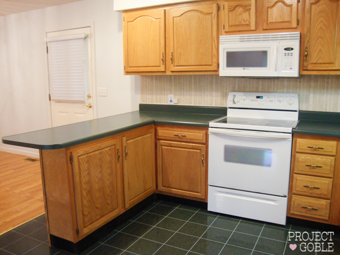 Kitchen Transformation White Cabinets Painted Counters With White Appliances Project Goble